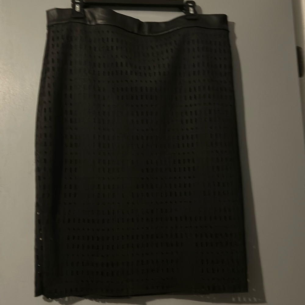 Long black pencil skirt with a leather top zips in a bag size extra large